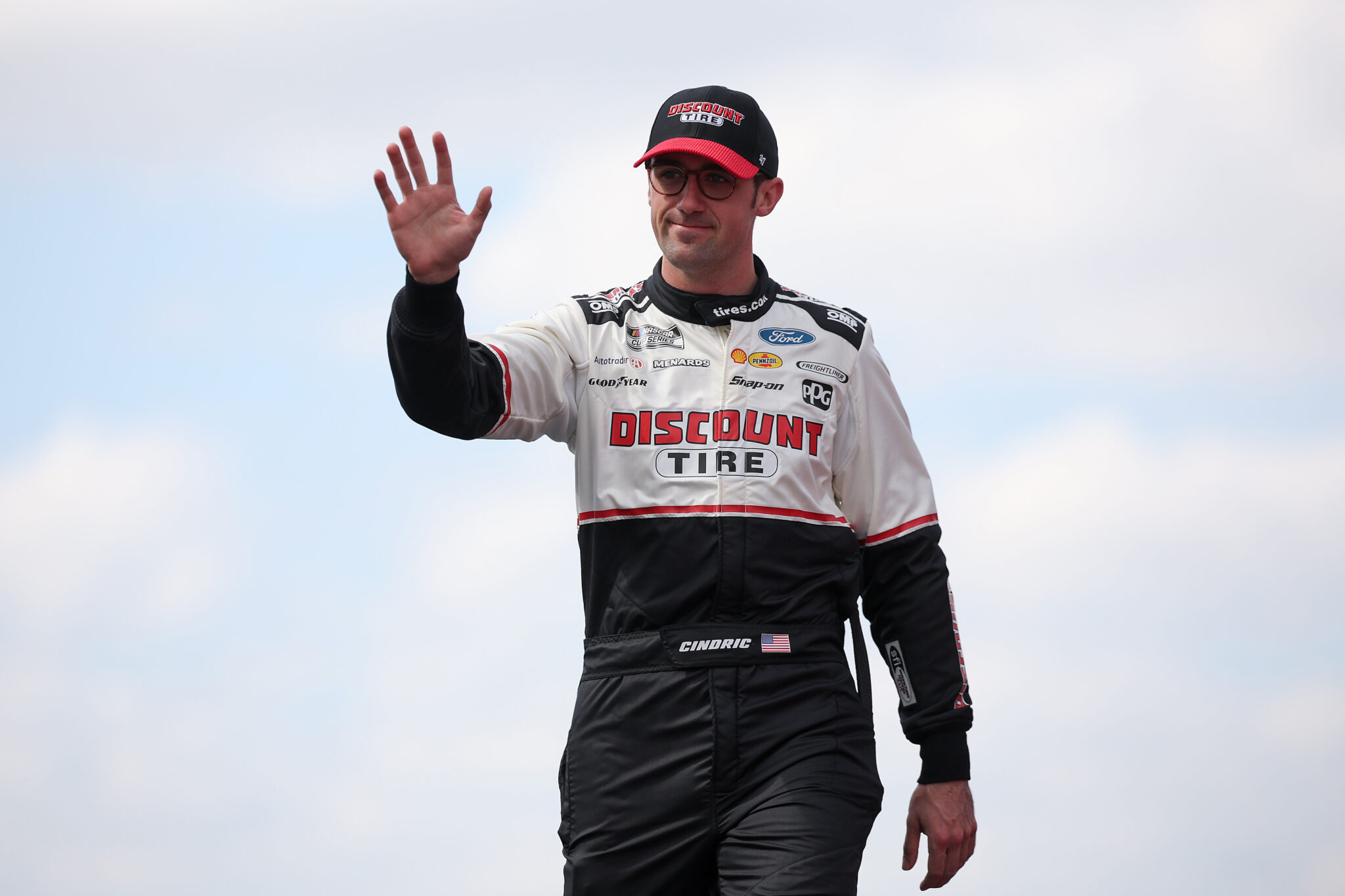 AUSTIN, TEXAS - MARCH 02: Austin Cindric, driver of the #2 Discount Tire Ford, walks onstage during driver intros prior to the NASCAR Cup Series EchoPark Automotive Grand Prix at Circuit of The Americas on March 02, 2025 in Austin, Texas.