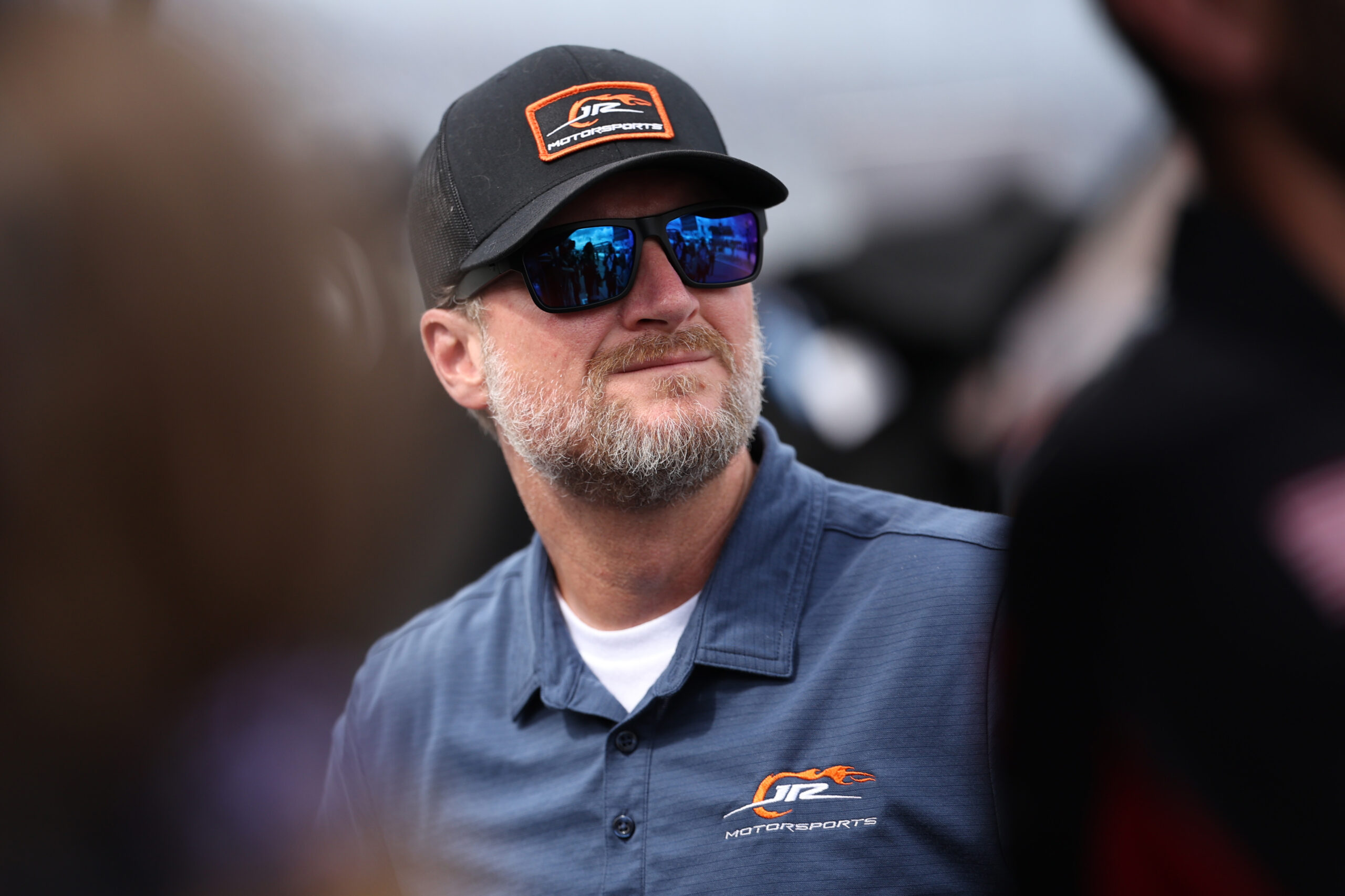 DAYTONA BEACH, FLORIDA - AUGUST 22: Team owner Dale Earnhardt Jr. looks on during qualifying for the NASCAR Xfinity Series Wawa 250 Powered By Coca-Cola at Daytona International Speedway on August 22, 2025 in Daytona Beach, Florida. (Photo by James Gilbert/Getty Images)
