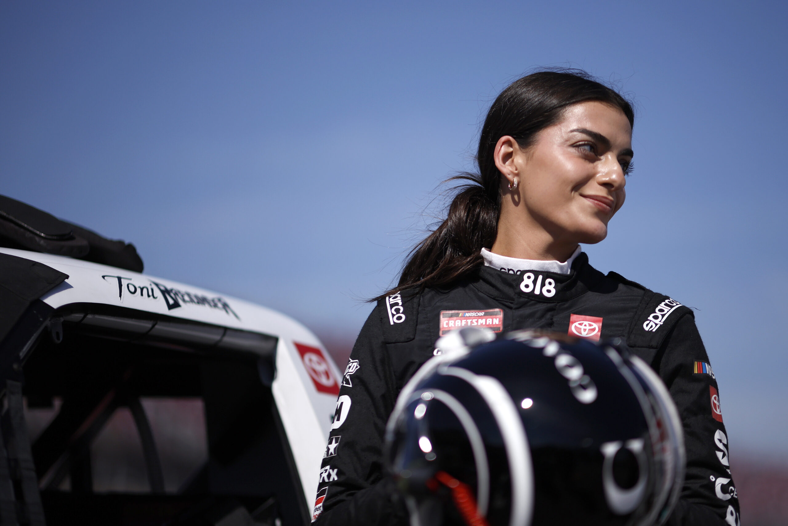 TALLADEGA, ALABAMA - OCTOBER 17: Toni Breidinger, driver of the #5 Coach Toyota, looks on during qualifying for the NASCAR Craftsman Truck Series Love's RV Stop 225 at Talladega Superspeedway on October 17, 2025 in Talladega, Alabama. (Photo by Sean Gardner/Getty Images)