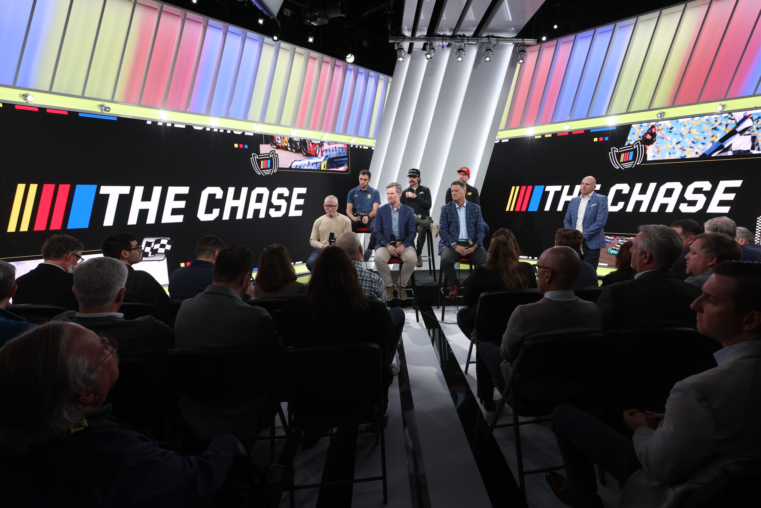 CONCORD, NORTH CAROLINA - JANUARY 12: (L to R) Mark Martin, Chase Elliott, Dale Earnhardt Jr., Ryan Blaney, Steve O'Donnell and Chase Briscoe address the media during the NASCAR Championship Format Announcement at NASCAR Productions Facility on January 12, 2026 in Concord, North Carolina. (Photo by David Jensen/Getty Images)