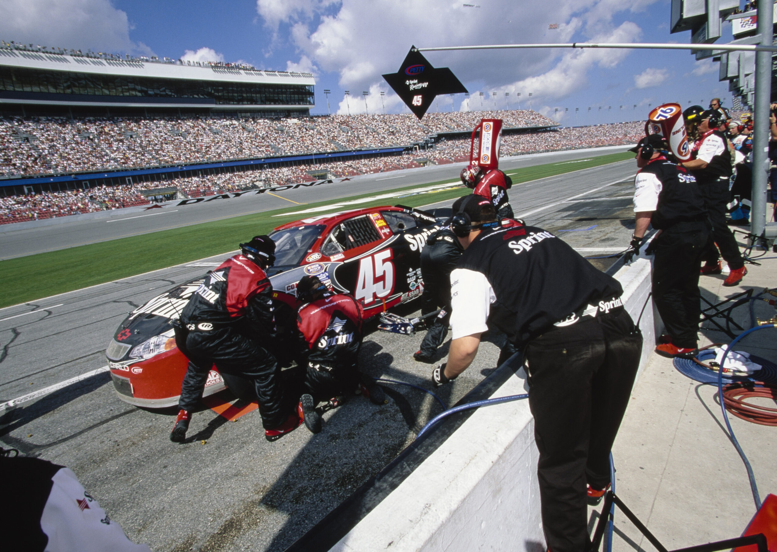 Adam Petty (1980 - 2000) from the United States driving the #45 Sprint Petty Enterprises Chevrolet Monte Carlo makes a pitstop for refueling and tyres during the 2000 NASCAR Busch Grand National Series NAPA Auto Parts 300 race on 19th February 2000 at the Daytona International Speedway, Daytona Beach, Florida, United States.