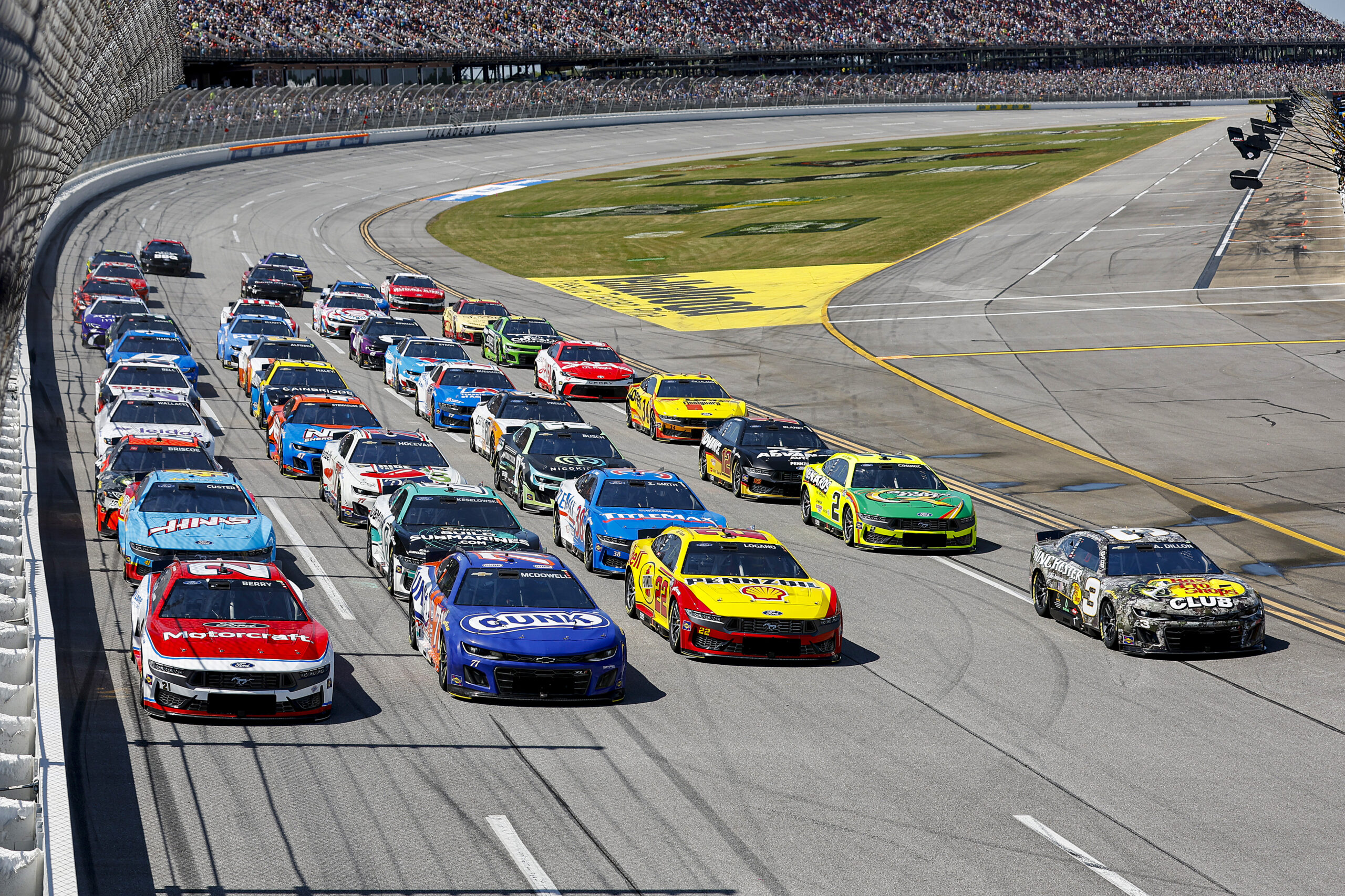 TALLADEGA, ALABAMA - APRIL 27: Josh Berry, driver of the #21 Motorcraft/Quick Lane Ford, Michael McDowell, driver of the #71 GUNK Chevrolet, Joey Logano, driver of the #22 Shell Pennzoil Ford, and Austin Dillon, driver of the #3 Bass Pro Shops/Winchester Chevrolet, race during the NASCAR Cup Series Jack Link's 500 at Talladega Superspeedway on April 27, 2025 in Talladega, Alabama. (Photo by Logan Riely/Getty Images)