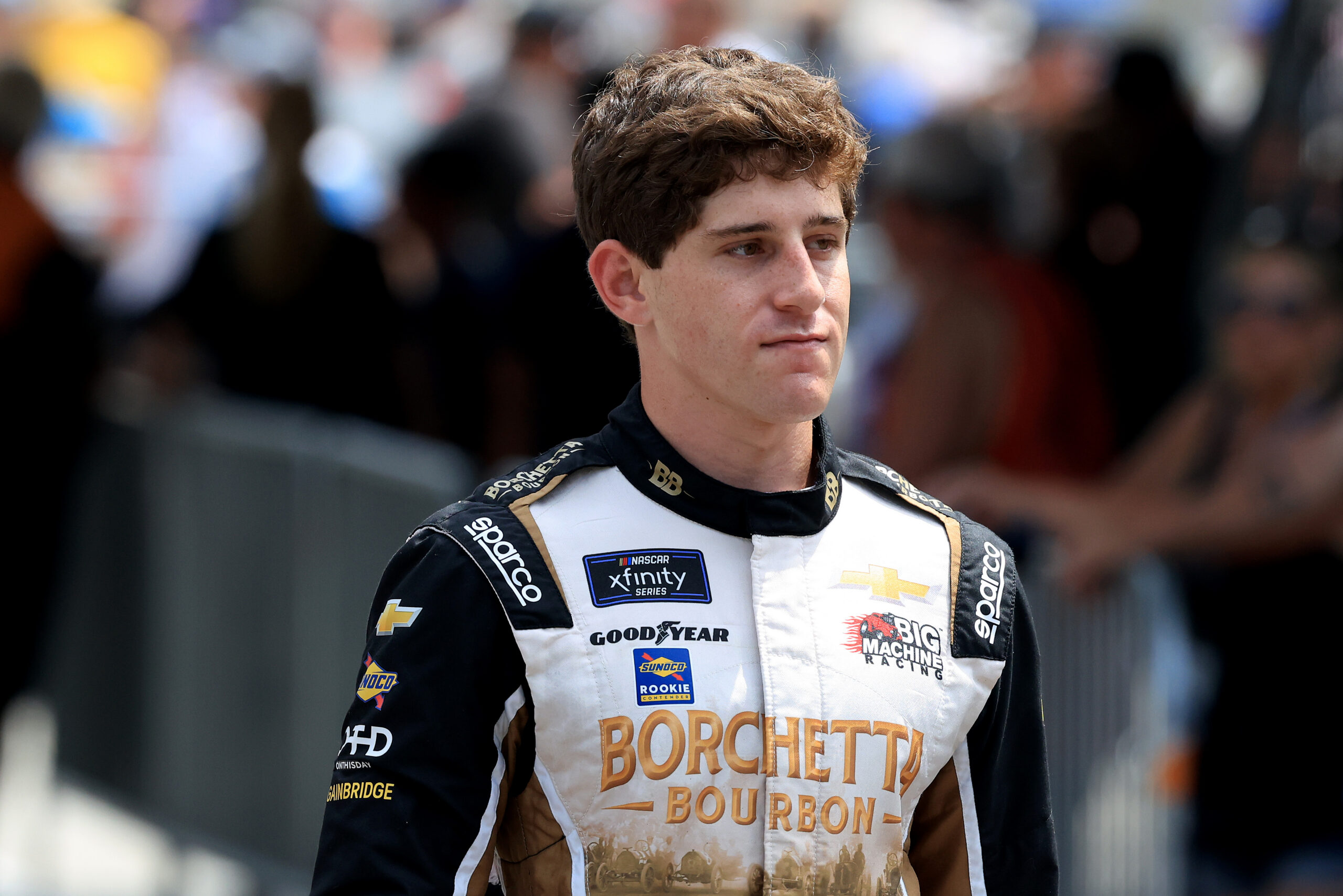 INDIANAPOLIS, INDIANA - JULY 26: Nicholas Sanchez, driver of the #48 GainBridge Chevrolet, walks the grid during qualifying for the NASCAR Xfinity Series Pennzoil 250 at Indianapolis Motor Speedway on July 26, 2025 in Indianapolis, Indiana. (Photo by Justin Casterline/Getty Images)