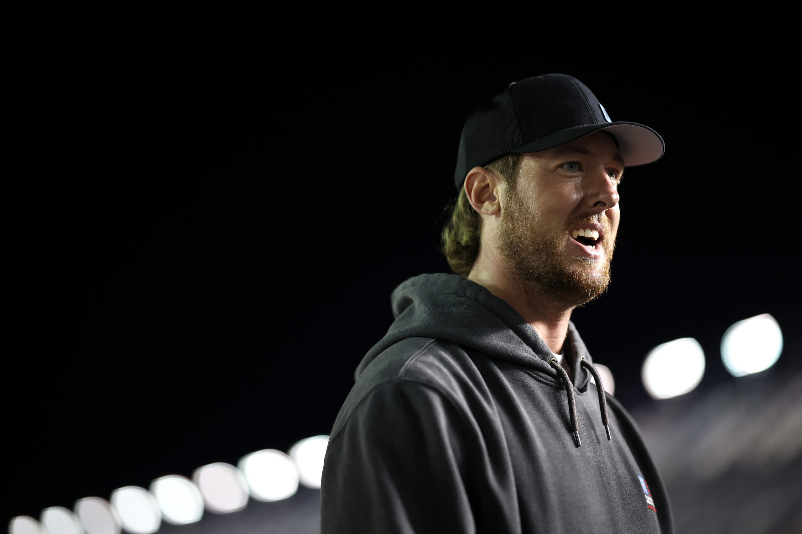 DAYTONA BEACH, FLORIDA - FEBRUARY 11: Garrett Mitchell, also known as Cleetus McFarland looks on during qualifying for the NASCAR Cup Series Daytona 500 at Daytona International Speedway on February 11, 2026 in Daytona Beach, Florida. (Photo by James Gilbert/Getty Images)