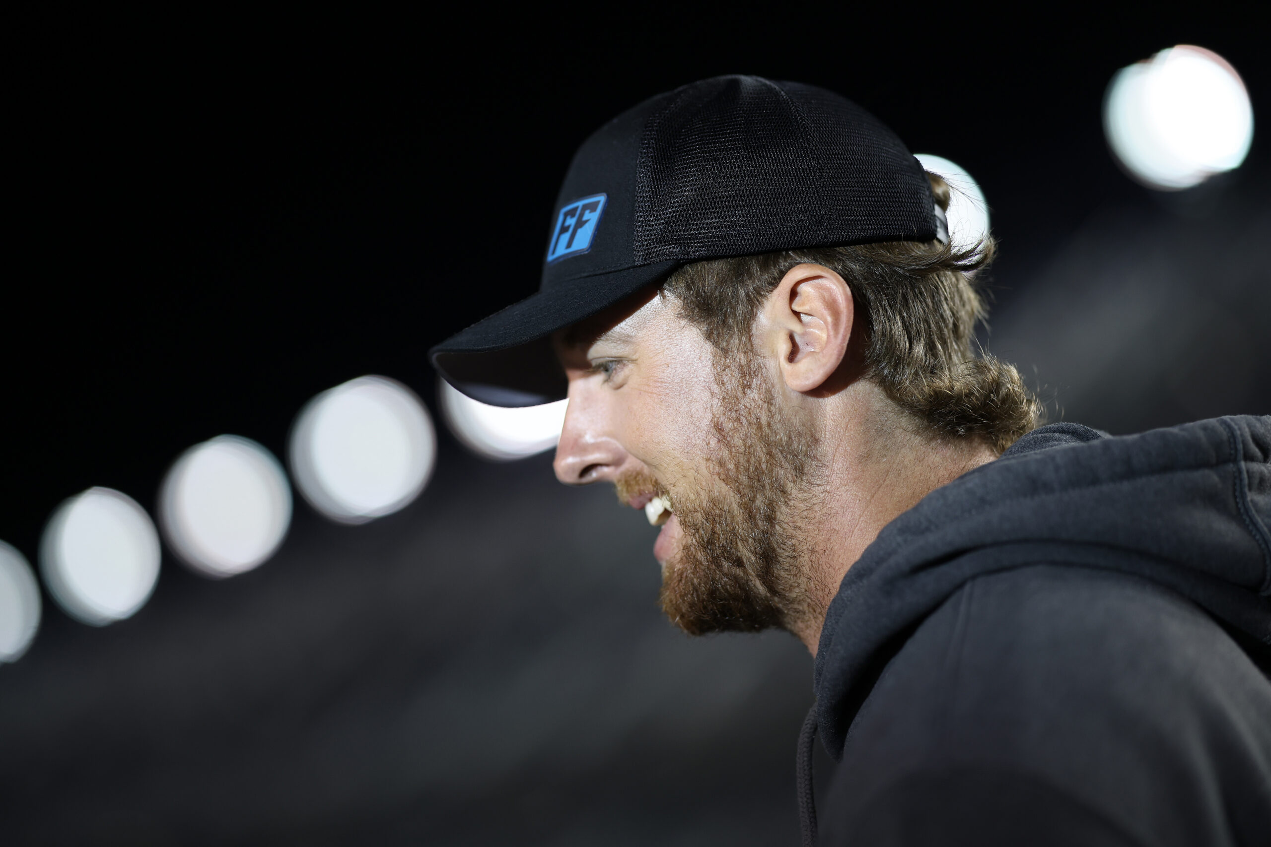 DAYTONA BEACH, FLORIDA - FEBRUARY 11: Garrett Mitchell, also known as Cleetus McFarland looks on during qualifying for the NASCAR Cup Series Daytona 500 at Daytona International Speedway on February 11, 2026 in Daytona Beach, Florida. (Photo by James Gilbert/Getty Images)