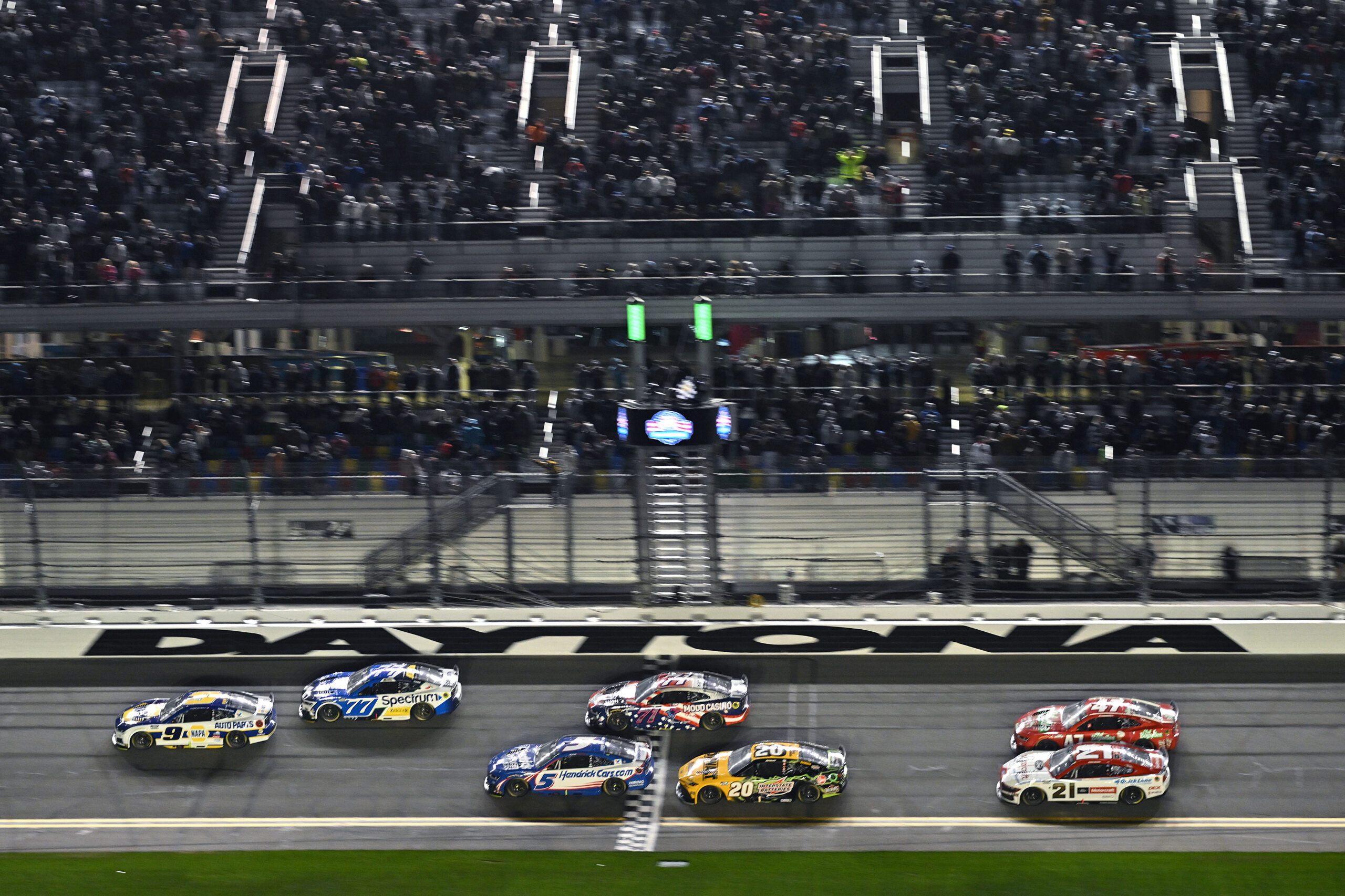 DAYTONA BEACH, FLORIDA - FEBRUARY 12: Chase Elliott, driver of the #9 NAPA Auto Parts Chevrolet, crosses the finish line to win Duel 2 for the NASCAR Cup Series Daytona 500 at Daytona at Daytona International Speedway on February 12, 2026 in Daytona Beach, Florida. (Photo by Jeff Curry/Getty Images)