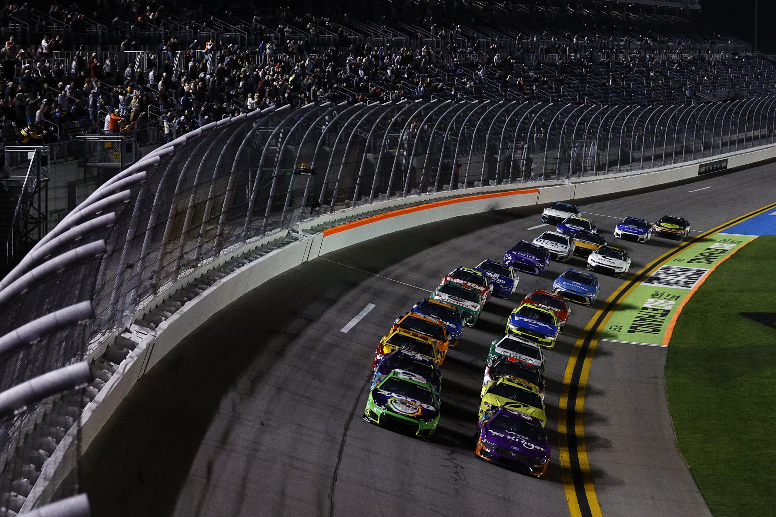 DAYTONA BEACH, FLORIDA - FEBRUARY 12: Ryan Preece, driver of the #60 Kroger/Viva Towels Ford, and Kyle Busch, driver of the #8 zone Jalapeno Lime Chevrolet, race during Duel 1 for the NASCAR Cup Series Daytona 500 at Daytona at Daytona International Speedway on February 12, 2026 in Daytona Beach, Florida. (Photo by Sean Gardner/Getty Images)