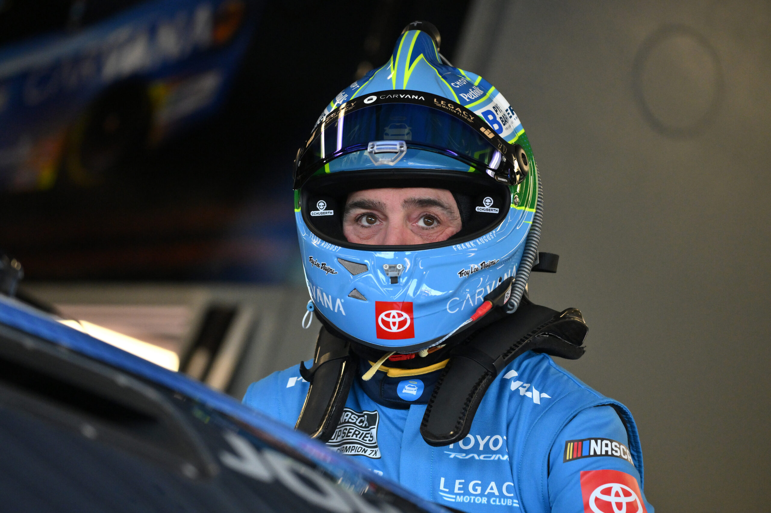 DAYTONA BEACH, FLORIDA - FEBRUARY 13: Jimmie Johnson, driver of the #84 Carvana Toyota, enters his car in the garage area during practice for the NASCAR Cup Series Daytona 500 at Daytona International Speedway on February 13, 2026 in Daytona Beach, Florida. (Photo by Jeff Curry/Getty Images)