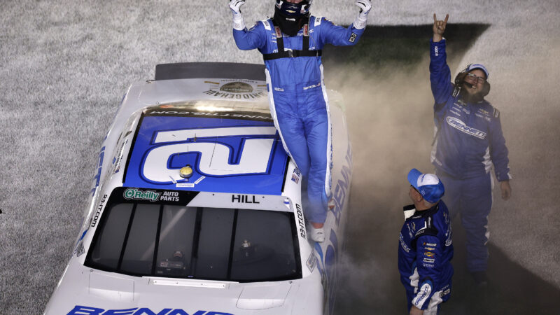 DAYTONA BEACH, FLORIDA - FEBRUARY 14: Austin Hill, driver of the #21 Bennett Transportation Chevrolet, celebrates after winning the NASCAR O'Reilly Auto Parts Series United Rentals 300 at Daytona International Speedway on February 14, 2026 in Daytona Beach, Florida. (Photo by Sean Gardner/Getty Images)