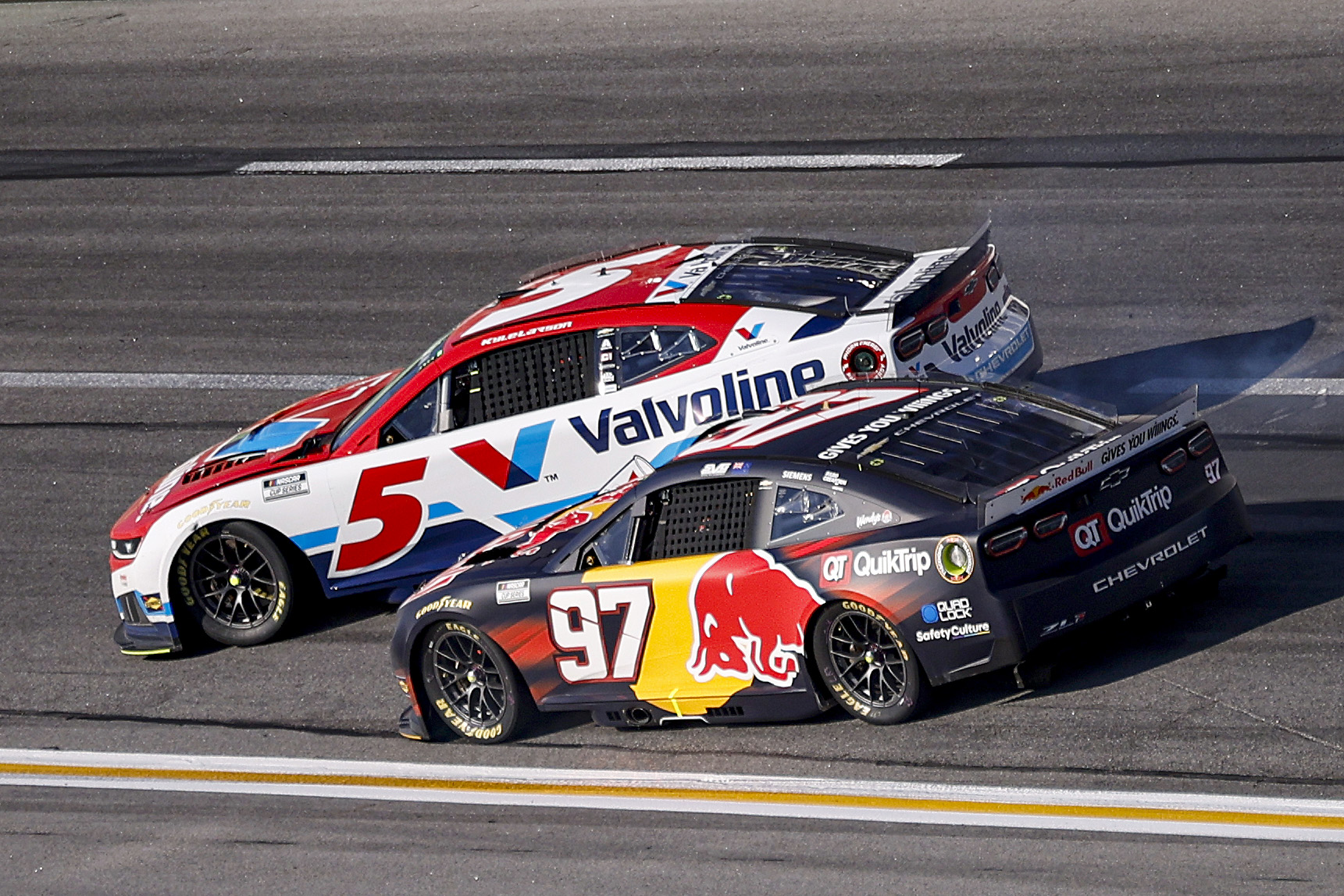 HAMPTON, GEORGIA - FEBRUARY 22: Kyle Larson, driver of the #5 Valvoline Chevrolet, spins after an on-track incident ahead of Shane Van Gisbergen, driver of the #97 Red Bull Chevrolet, during the NASCAR Cup Series Autotrader 400 at Echo Park Speedway on February 22, 2026 in Hampton, Georgia. (Photo by Sean Gardner/Getty Images)