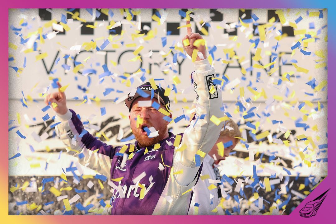 DARLINGTON, SOUTH CAROLINA - MARCH 22: Tyler Reddick, driver of the #45 Xfinity Toyota, celebrates with his son, Beau Reddick in victory lane after winning the NASCAR Cup Series Goodyear 400 at Darlington Raceway on March 22, 2026 in Darlington, South Carolina. (Photo by David Jensen/Getty Images)