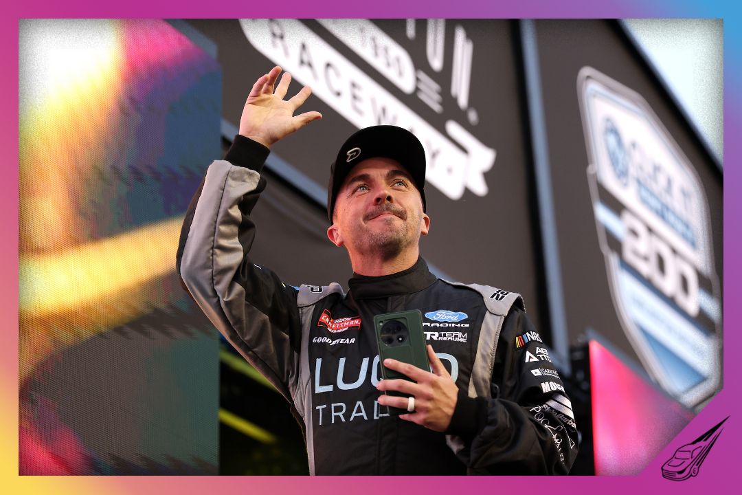 DARLINGTON, SOUTH CAROLINA - MARCH 20: Frankie Muniz, driver of the #33 Lucid Training Ford, waves to fans as he walks onstage during driver intros prior to the NASCAR Craftsman Truck Series Buckle Up South Carolina 200 at Darlington Raceway on March 20, 2026 in Darlington, South Carolina. (Photo by David Jensen/Getty Images)