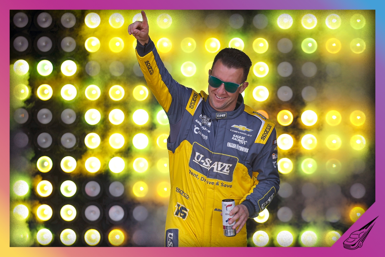 LAS VEGAS, NEVADA - MARCH 15: AJ Allmendinger, driver of the #16 U-Save Chevrolet, waves to fans as he walks onstage during driver intros prior to the NASCAR Cup Series Pennzoil 400 presented by Jiffy Lube at Las Vegas Motor Speedway on March 15, 2026 in Las Vegas, Nevada. (Photo by Sean Gardner/Getty Images)