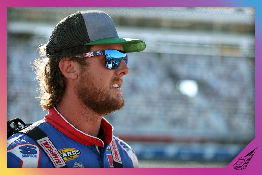 CONCORD, NORTH CAROLINA - MAY 23: Garrett Mitchell, also known as Cleetus McFarland, driver of the #30 Kenetik Ford, waits on the grid prior to the ARCA Menards Series General Tire 150 at Charlotte Motor Speedway on May 23, 2025 in Concord, North Carolina. (Photo by David Jensen/Getty Images)