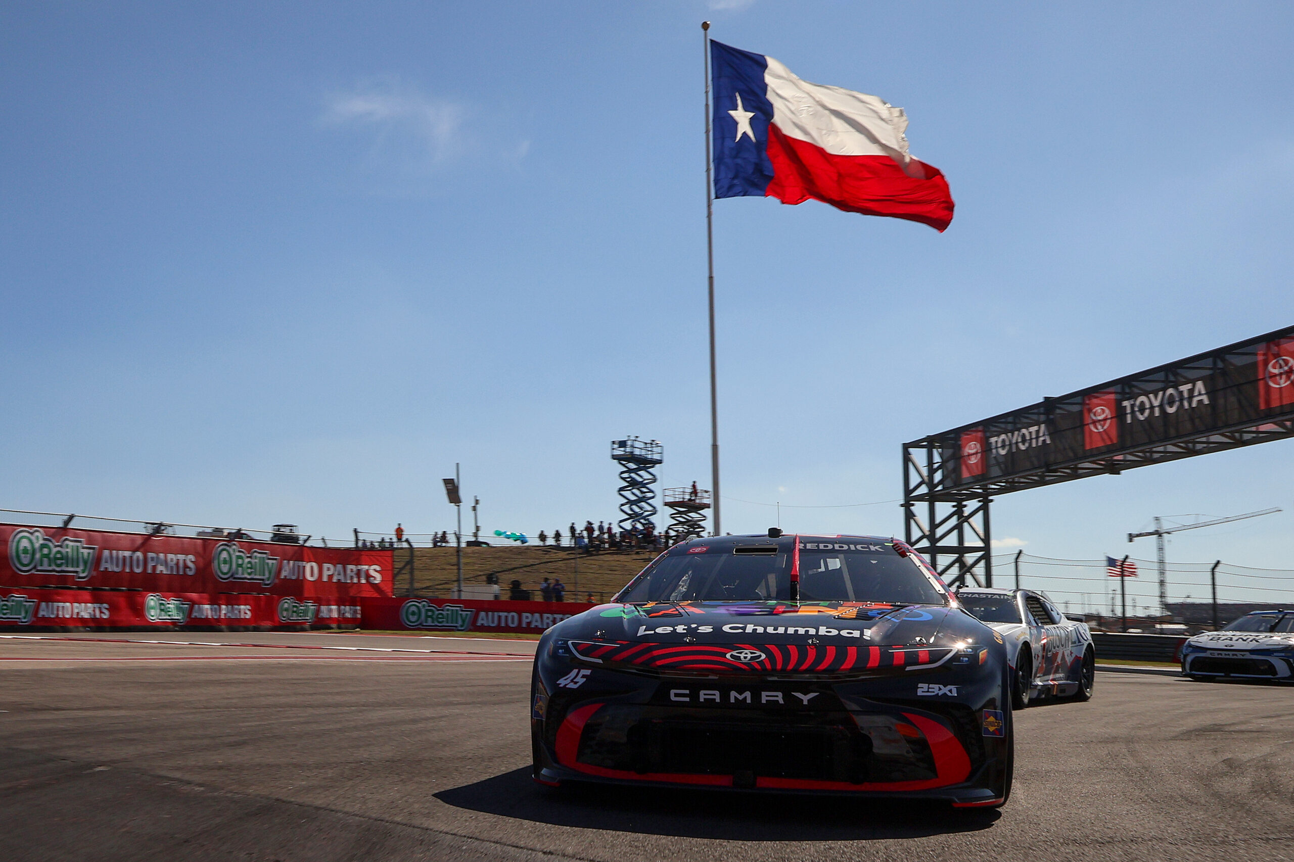 AUSTIN, TEXAS - MARCH 01: Tyler Reddick, driver of the #45 Chumba Casino Toyota, leads the field on a pace lap prior to the NASCAR Cup Series DuraMax Grand Prix Powered by RelaDyne at Circuit of The Americas on March 01, 2026 in Austin, Texas.