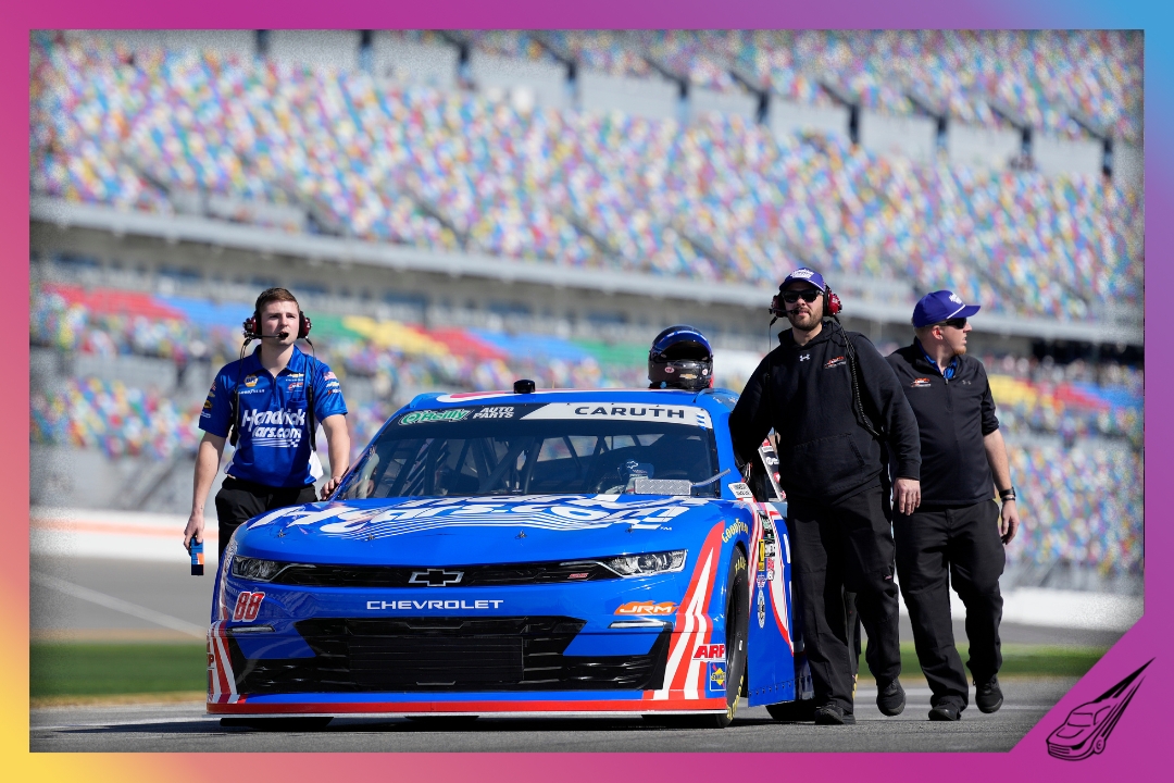 DAYTONA BEACH, FLORIDA - FEBRUARY 14: Crew members push the #88 HendrickCars.com Chevrolet, driven by Rajah Caruth on the grid during qualifying for the NASCAR O'Reilly Auto Parts Series United Rentals 300 at Daytona International Speedway on February 14, 2026 in Daytona Beach, Florida. (Photo by Patrick McDermott/Getty Images)