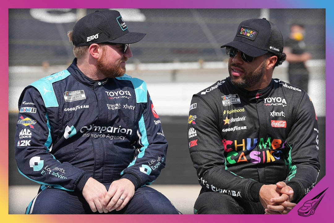 BRISTOL, TENNESSEE - APRIL 11: Tyler Reddick, driver of the #45 Comparion Insurance Toyota, (L) and Bubba Wallace, driver of the #23 WWE/Chumba Casino Toyota, talk on the grid during practice for the NASCAR Cup Series Food City 500 at Bristol Motor Speedway on April 11, 2026 in Bristol, Tennessee. (Photo by Matt Kelley/Getty Images)