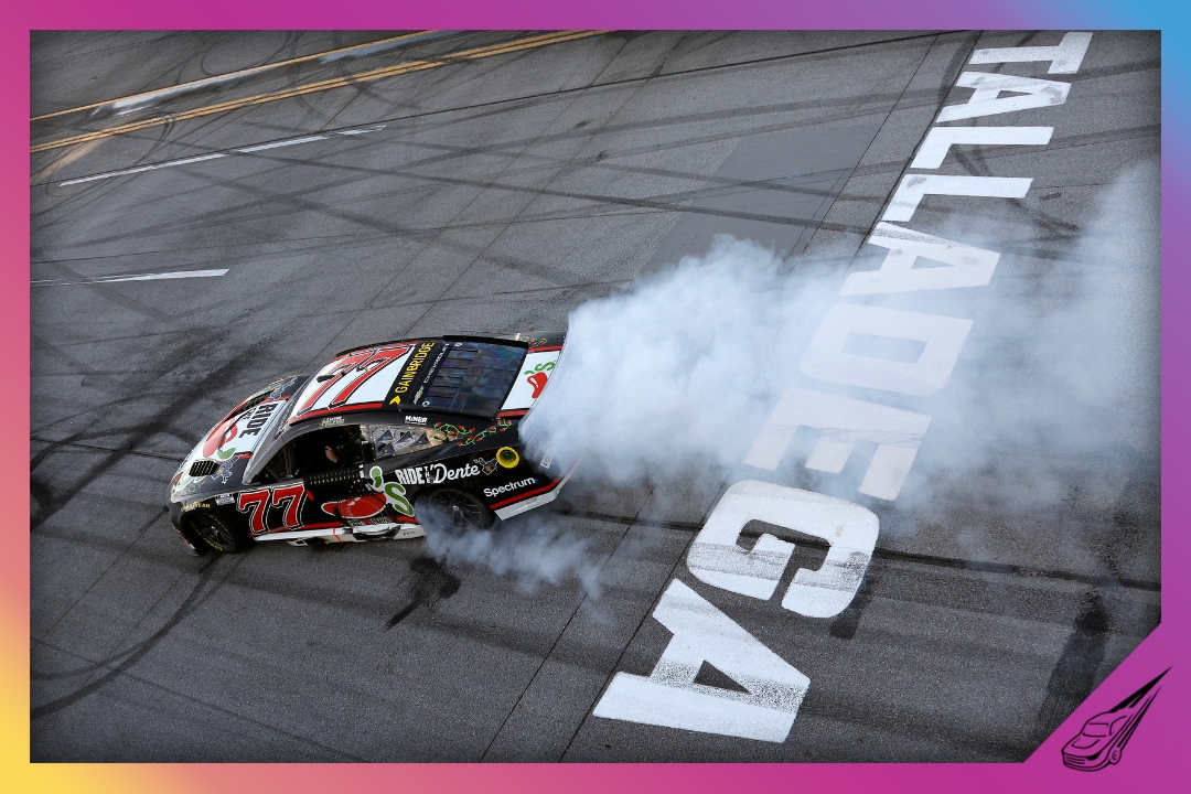 TALLADEGA, ALABAMA - APRIL 26: Carson Hocevar, driver of the #77 Chili's Ride the 'Dente Chevrolet, celebrates with a burnout after winning the NASCAR Cup Series Jack Link's 500 at Talladega Superspeedway on April 26, 2026 in Talladega, Alabama. (Photo by Sean Gardner/Getty Images)