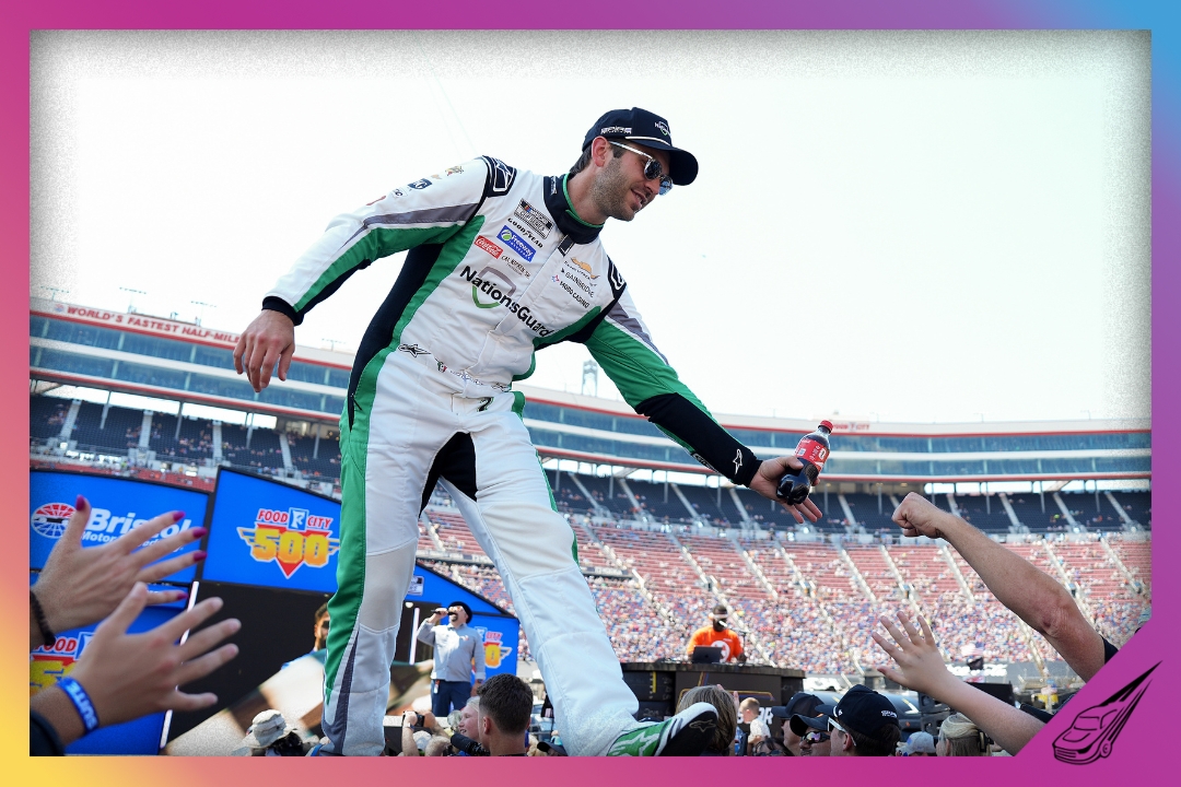 BRISTOL, TENNESSEE - APRIL 12: Daniel Suarez, driver of the #7 NationsGuard Chevrolet, greets fans as he walks onstage during driver intros prior to the NASCAR Cup Series Food City 500 at Bristol Motor Speedway on April 12, 2026 in Bristol, Tennessee. (Photo by Matt Kelley/Getty Images)