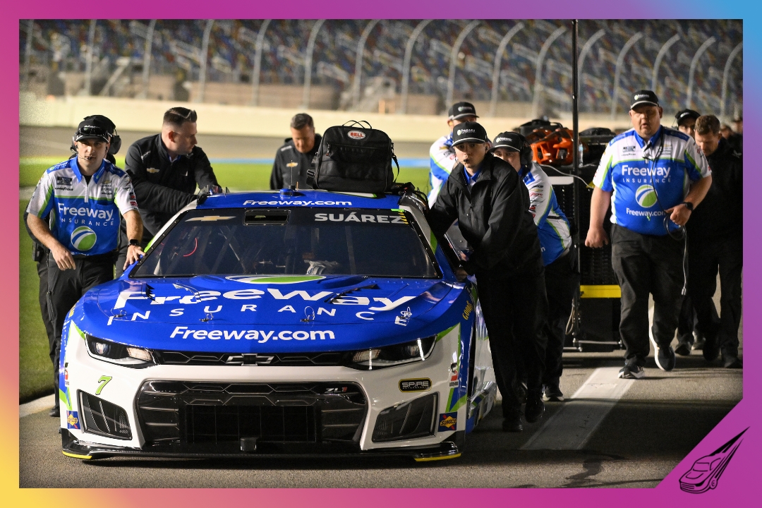 DAYTONA BEACH, FLORIDA - FEBRUARY 11: Crew members push the #7 Freeway Insurance Chevrolet, driven byDaniel Suarez on the gridduring qualifying for the NASCAR Cup Series Daytona 500 at Daytona International Speedway on February 11, 2026 in Daytona Beach, Florida. (Photo by Jeff Curry/Getty Images)