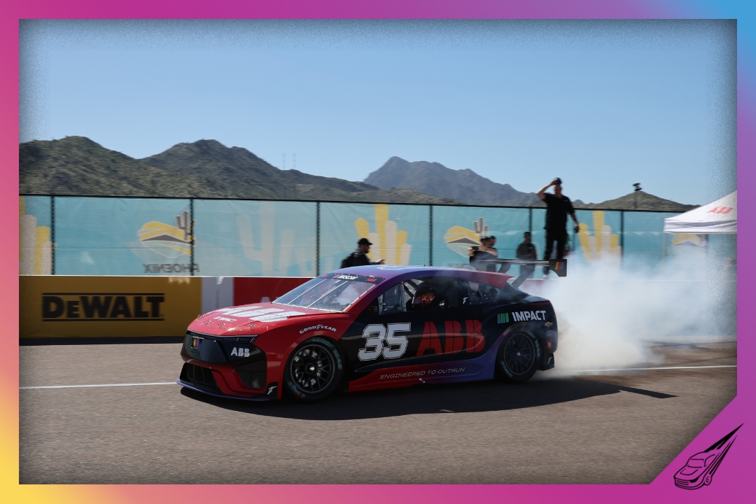 AVONDALE, ARIZONA - NOVEMBER 01: Corey LaJoie driver of the the ABB EV participates in the Pit Stop Challenge at the NASCAR Experience at Phoenix Raceway on November 01, 2025 in Avondale, Arizona. (Photo by James Gilbert/Getty Images)