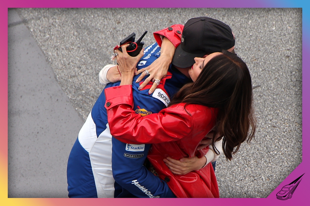 HAMPTON, GEORGIA - FEBRUARY 21: Kyle Busch, driver of the #7 HendrickCars.com Chevrolet, celebrates with wife, Samantha Busch after winning the NASCAR Craftsman Truck Series Fr8 Racing 208 at Echo Park Speedway on February 21, 2026 in Hampton, Georgia. (Photo by Jonathan Bachman/Getty Images)