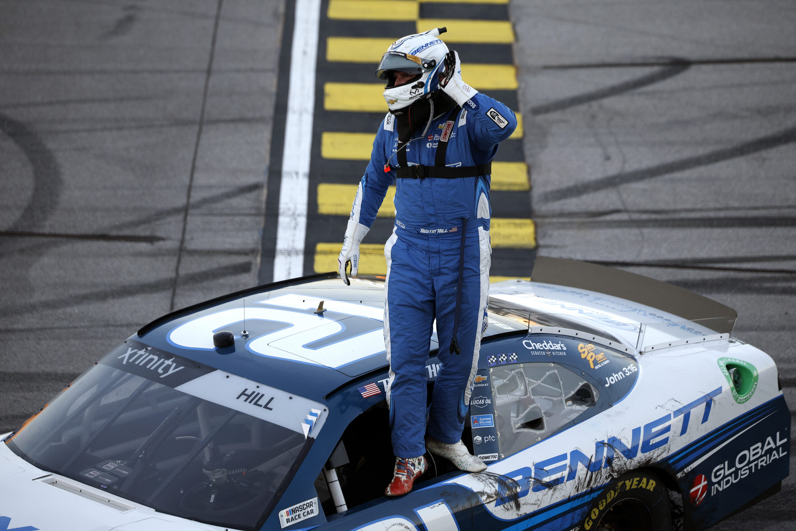 TALLADEGA, ALABAMA - OCTOBER 18: Austin Hill, driver of the #21 Bennett Transportation Chevrolet, celebrates after winning the NASCAR Xfinity Series United Rentals 250 at Talladega Superspeedway on October 18, 2025 in Talladega, Alabama. (Photo by Sean Gardner/Getty Images)