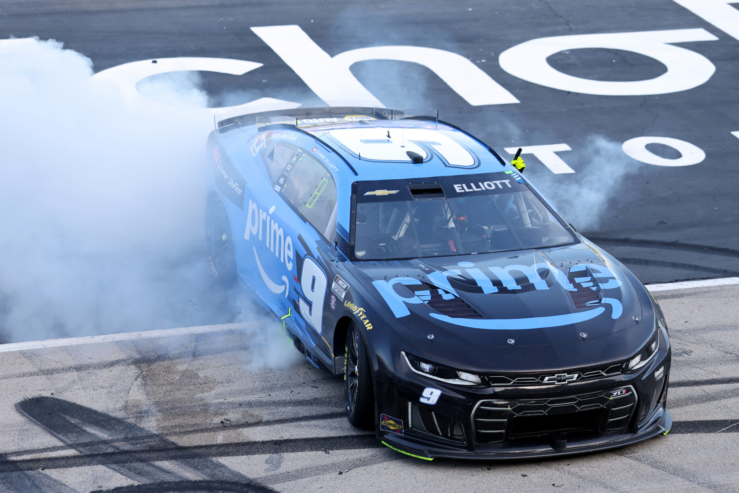 FORT WORTH, TEXAS - MAY 03: Chase Elliott, driver of the #9 Amazon Prime Chevrolet, celebrates with a burnout after winning the NASCAR Cup Series Würth 400 presented by LIQUI MOLY at Texas Motor Speedway on May 03, 2026 in Fort Worth, Texas. (Photo by Logan Riely/Getty Images)