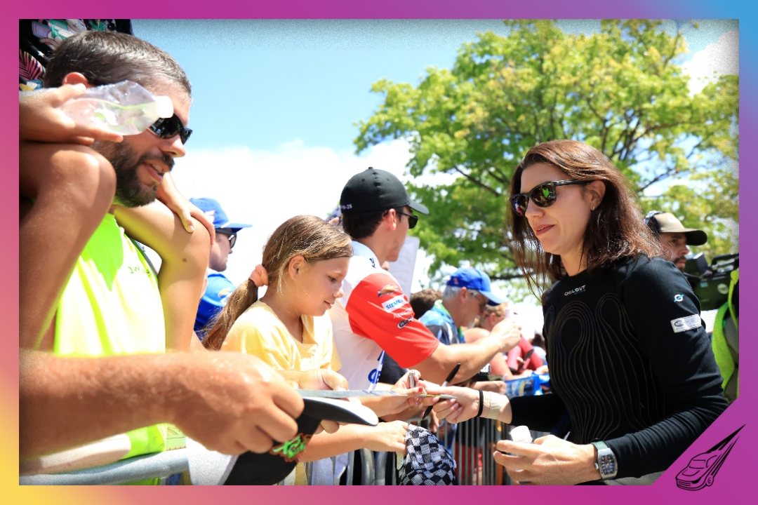 INDIANAPOLIS, INDIANA - JULY 27: Katherine Legge, driver of the #78 Droplight Chevrolet, signs autographs for NASCAR fans the NASCAR Cup Series Brickyard 400 Presented by PPG at Indianapolis Motor Speedway on July 27, 2025 in Indianapolis, Indiana. (Photo by Justin Casterline/Getty Images)