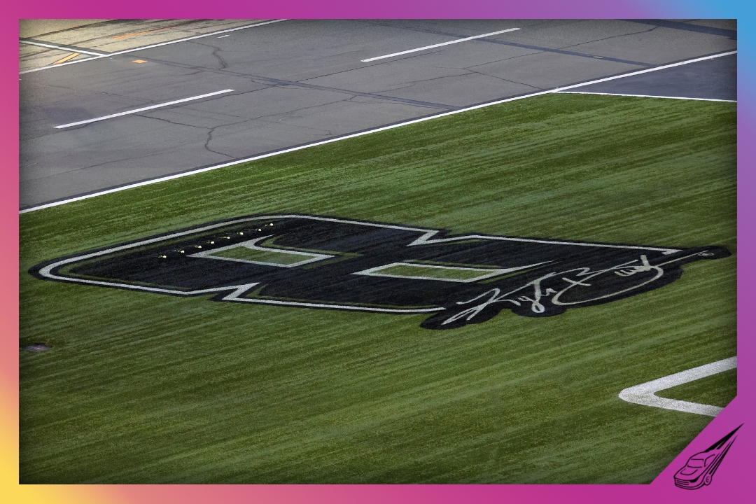 CONCORD, NORTH CAROLINA - MAY 24: A general view of the "8 with Kyle Busch signature" stenciled of the infield grass in honor of Kyle Busch, who passed away suddenly at the age of 41, duringthe NASCAR Cup Series Coca-Cola 600 at Charlotte Motor Speedway on May 24, 2026 in Concord, North Carolina. (Photo by Jonathan Bachman/Getty Images)