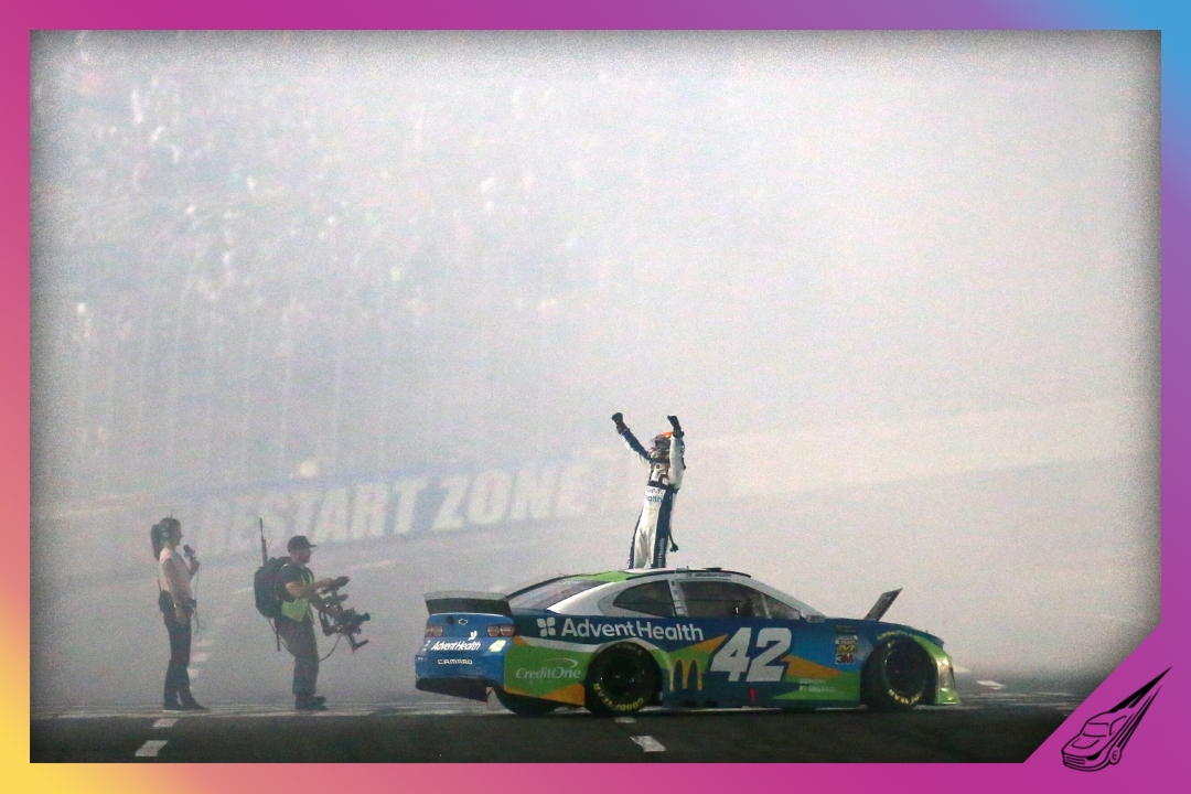 CHARLOTTE, NORTH CAROLINA - MAY 18: Kyle Larson, driver of the #42 Advent Health Chevrolet, celebrates winning the Monster Energy NASCAR Cup Series All-Star Race at Charlotte Motor Speedway on May 18, 2019 in Charlotte, North Carolina. (Photo by Sean Gardner/Getty Images)