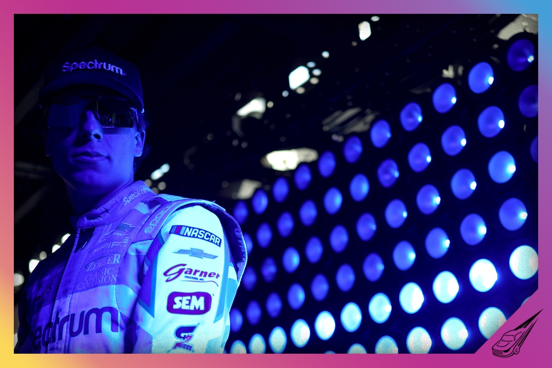 WATKINS GLEN, NEW YORK - MAY 10: Carson Hocevar, driver of the #77 Spectrum Chevrolet, waits backstage during pre-race ceremonies prior to the NASCAR Cup Series Go Bowling at The Glen at Watkins Glen International on May 10, 2026 in Watkins Glen, New York. (Photo by Chris Graythen/Getty Images)