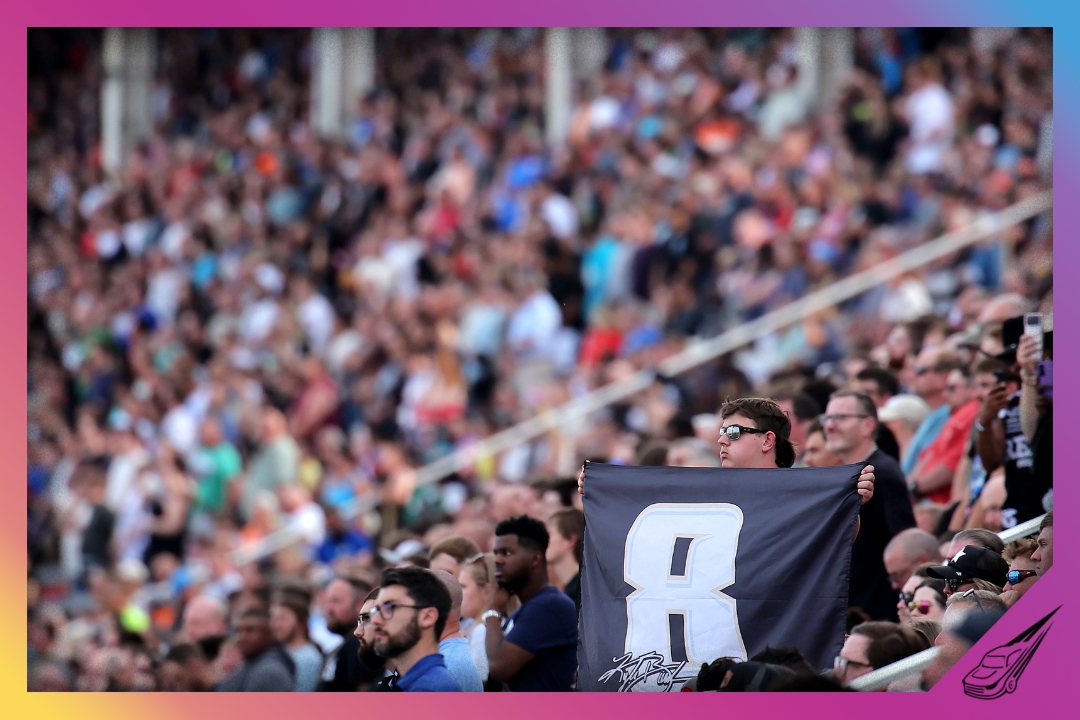 CONCORD, NORTH CAROLINA - MAY 24: A NASCAR fan displays a #8 flag during the remembrance ceremony for Kyle Busch, who passed away suddenly at the age of 41, from the grandstands prior to the NASCAR Cup Series Coca-Cola 600 at Charlotte Motor Speedway on May 24, 2026 in Concord, North Carolina. (Photo by Jonathan Bachman/Getty Images)