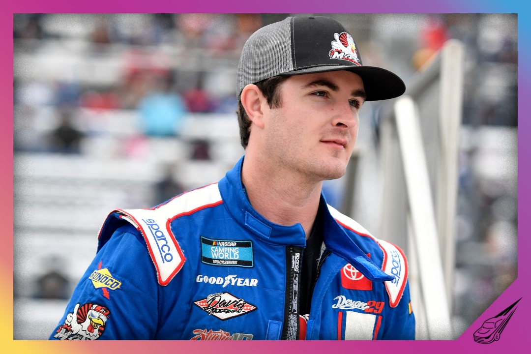 MARTINSVILLE, VIRGINIA - OCTOBER 30: Spencer Davis, driver of the #11 Inox Supreme Lubricants Toyota, walks on stage during pre-race ceremonies prior to the NASCAR Camping World Truck Series United Rentals 200 at Martinsville Speedway on October 30, 2021 in Martinsville, Virginia. (Photo by Logan Riely/Getty Images)