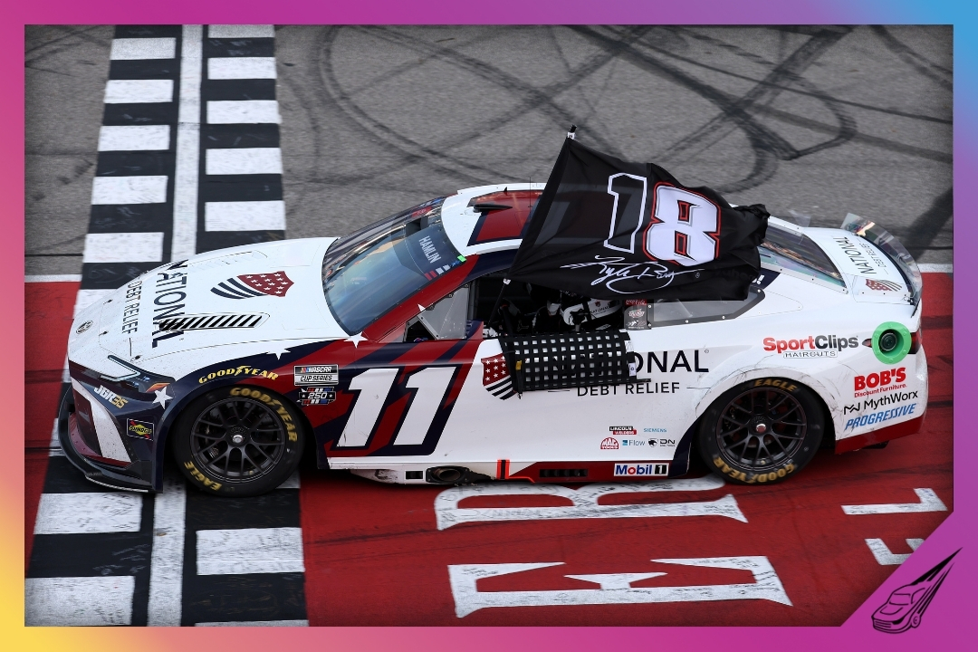 BROOKLYN, MICHIGAN - JUNE 07: Denny Hamlin, driver of the #11 National Debt Relief Toyota, waves an 18 - 8 flag in honor of the late Kyle Busch after winning the NASCAR Cup Series FireKeepers Casino 400 at Michigan International Speedway on June 07, 2026 in Brooklyn, Michigan. (Photo by Brett Farmer/Getty Images)
