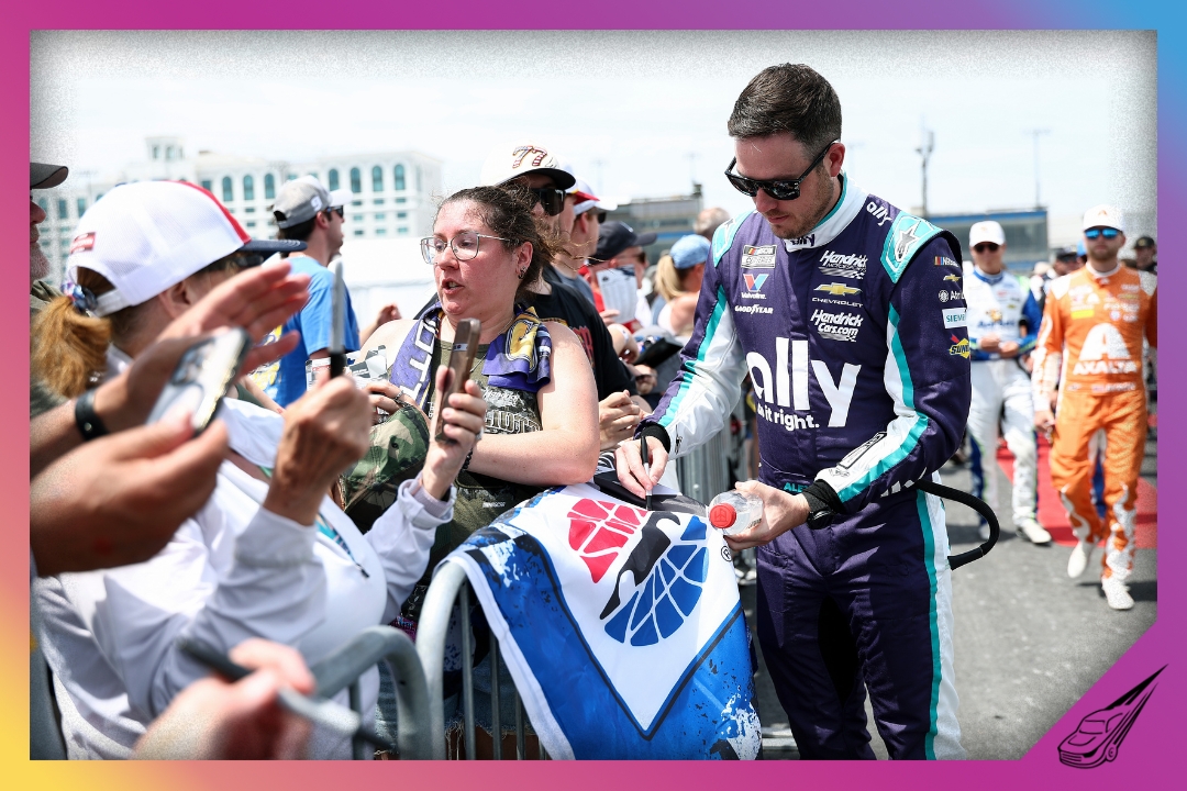 DOVER, DELAWARE - MAY 17: Alex Bowman, driver of the #48 Ally Dragons Chevrolet, signs autographs for NASCAR fans prior to he NASCAR Cup Series All-Star Race at Dover Motor Speedway on May 17, 2026 in Dover, Delaware. (Photo by Meg Oliphant/Getty Images)