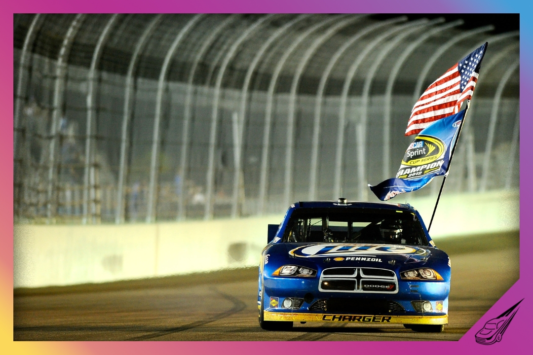 HOMESTEAD, FL - NOVEMBER 18: Brad Keselowski, driver of the #2 Miller Lite Dodge, celebrates after winning the series championship and finishing in fifteenth place for the NASCAR Sprint Cup Series Ford EcoBoost 400 at Homestead-Miami Speedway on November 18, 2012 in Homestead, Florida. (Photo by Jared C. Tilton/Getty Images for NASCAR)