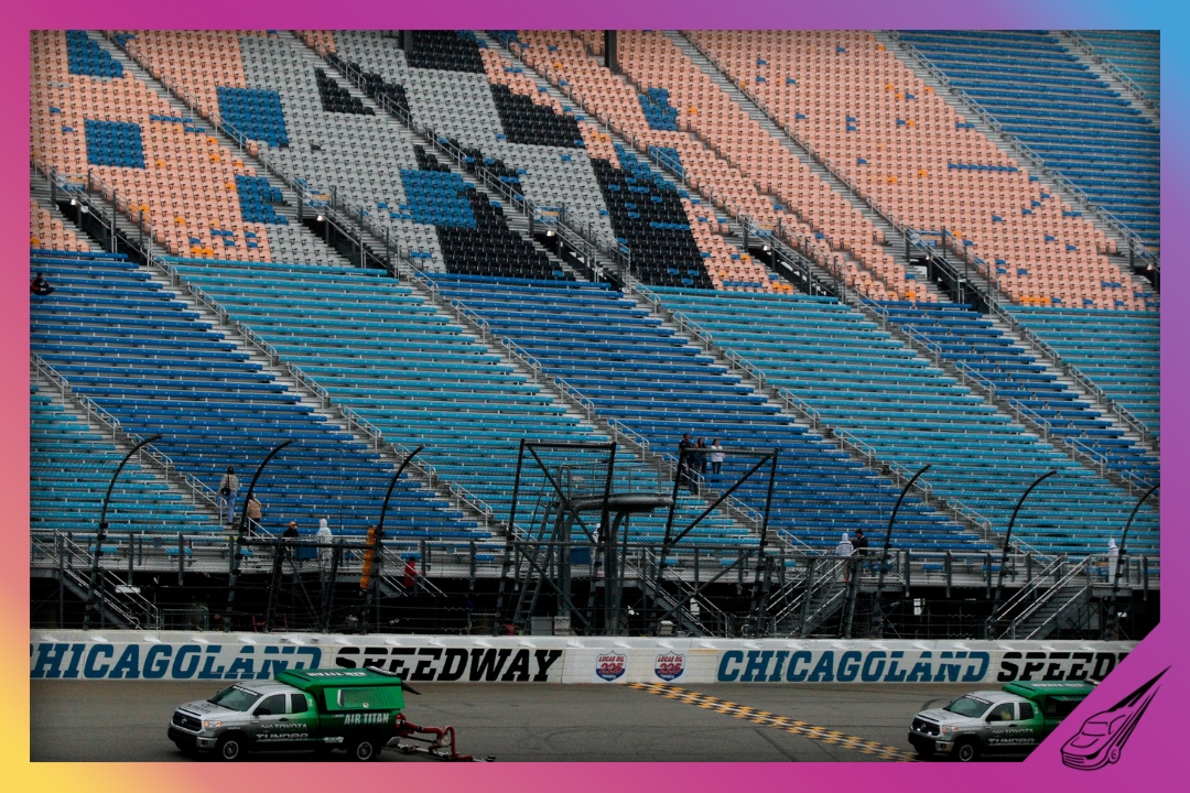 JOLIET, IL - SEPTEMBER 12: Track dryers run during a rain delay in qualifying for the NASCAR Camping World Truck Series Lucas Oil 225 at Chicagoland Speedway on September 12, 2014 in Joliet, Illinois. (Photo by Sean Gardner/Getty Images)