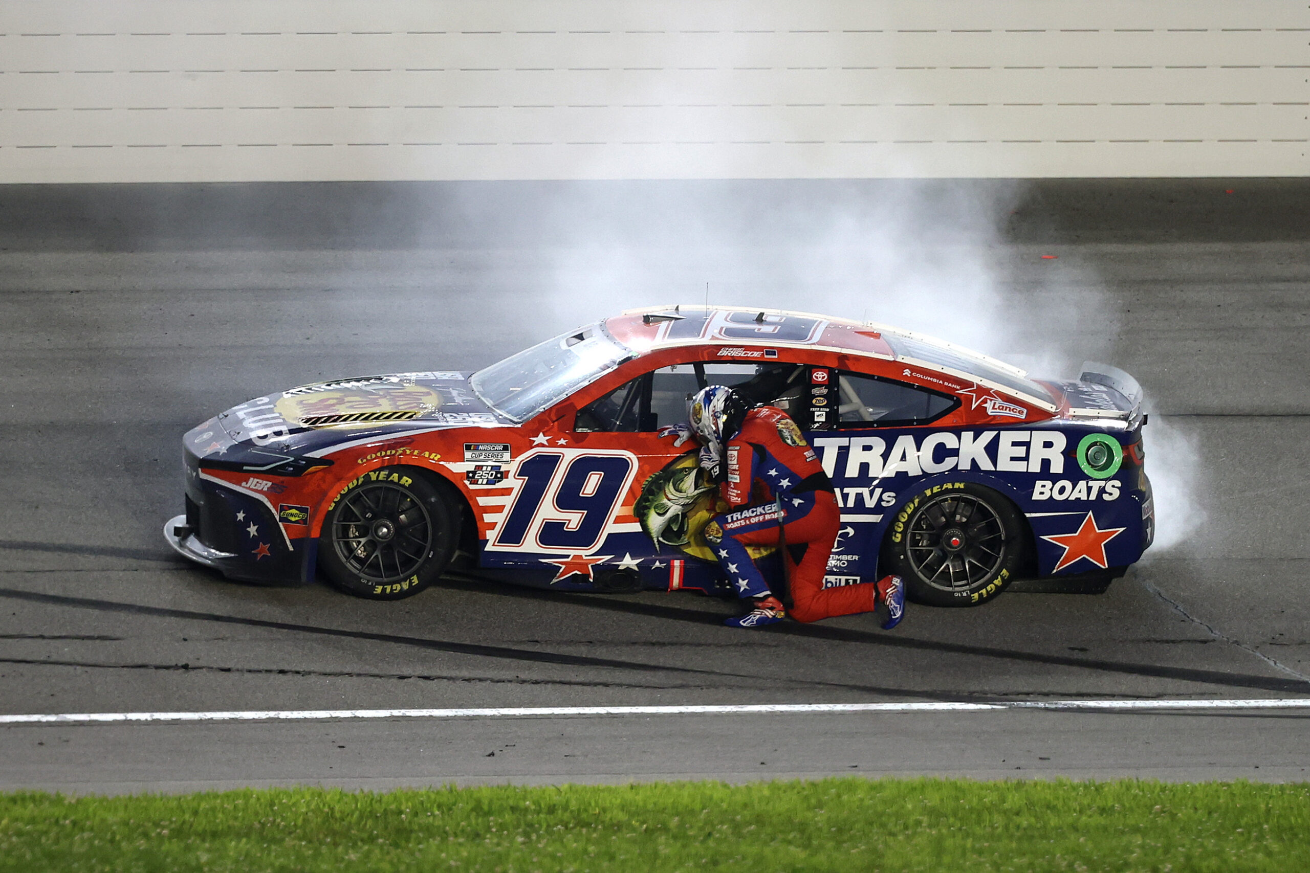 JOLIET, ILLINOIS - JULY 05: Chase Briscoe, driver of the #19 Bass Pro Shops Toyota, reacts after winning the NASCAR Cup Series eero 400 at Chicagoland Speedway on July 05, 2026 in Joliet, Illinois. (Photo by James Gilbert/Getty Images)