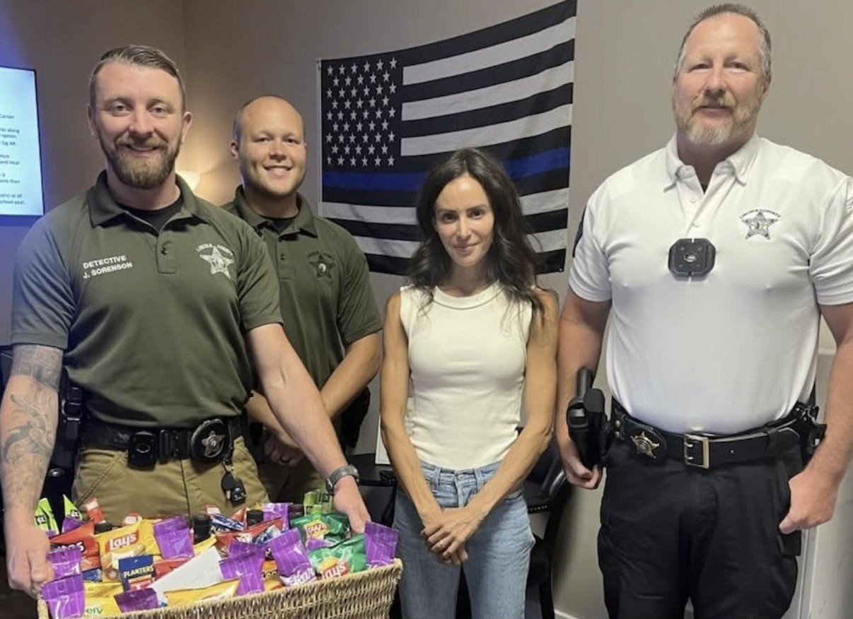 Samantha Busch with Denver police officers