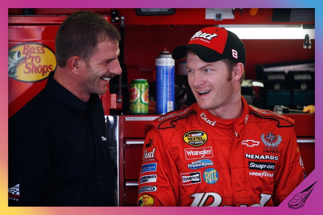 TALLADEGA, AL - OCTOBER 06: (L-R) NASCAR Craftsman Truck Series driver Kerry Earnahrdt, talks with his brother Dale Earnahrdt Jr., driver of the #8 Budweiser Chevrolet, while in the garage, during practice for the NASCAR Nextel Cup Series Ford 500 on October 6, 2006 at Talladega Superspeedway in Talladega, Alabama. (Photo by Chris Graythen/Getty Images)