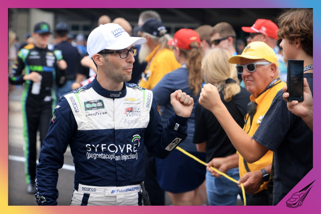 INDIANAPOLIS, INDIANA - JULY 25: Patrick Staropoli, driver of the #48 Syfovre Chevrolet, fist bumps NASCAR fans prior to the NASCAR O'Reilly Auto Parts Series Pennzoil 250 Presented by Take 5 Oil Change at Indianapolis Motor Speedway on July 25, 2026 in Indianapolis, Indiana. (Photo by Justin Casterline/Getty Images)