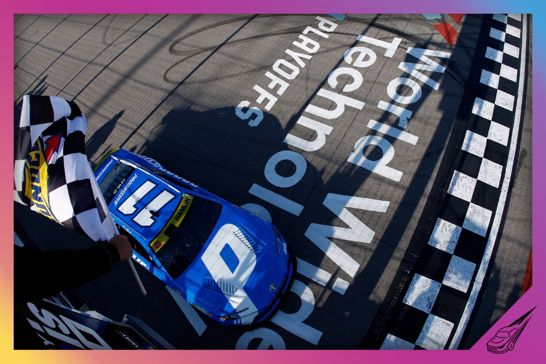 MADISON, ILLINOIS - SEPTEMBER 07: Denny Hamlin, driver of the #11 Progressive Toyota, takes the checkered flag to win the NASCAR Cup Series Enjoy Illinois 300 at WWT Raceway on September 07, 2025 in Madison, Illinois. (Photo by Sean Gardner/Getty Images)