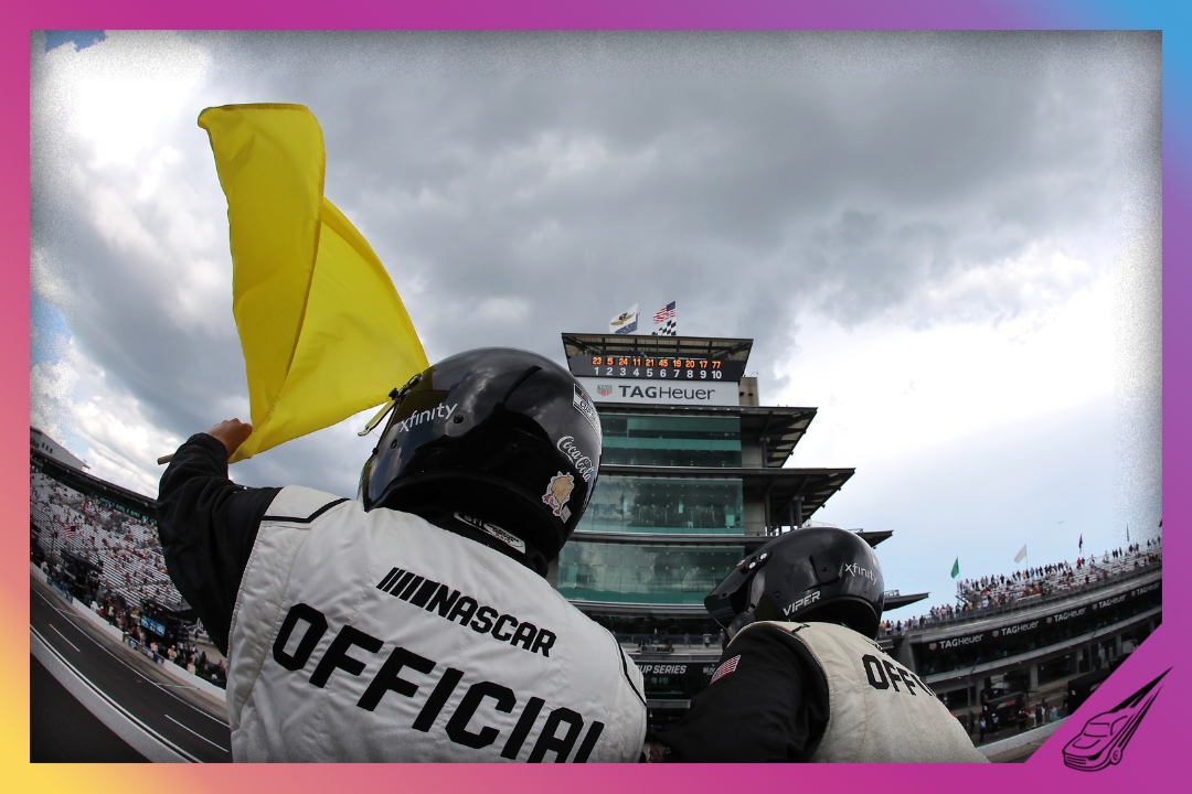 INDIANAPOLIS, INDIANA - JULY 27: A NASCAR Official waves the yellow caution flag during the NASCAR Cup Series Brickyard 400 Presented by PPG at Indianapolis Motor Speedway on July 27, 2025 in Indianapolis, Indiana. (Photo by Jonathan Bachman/Getty Images)